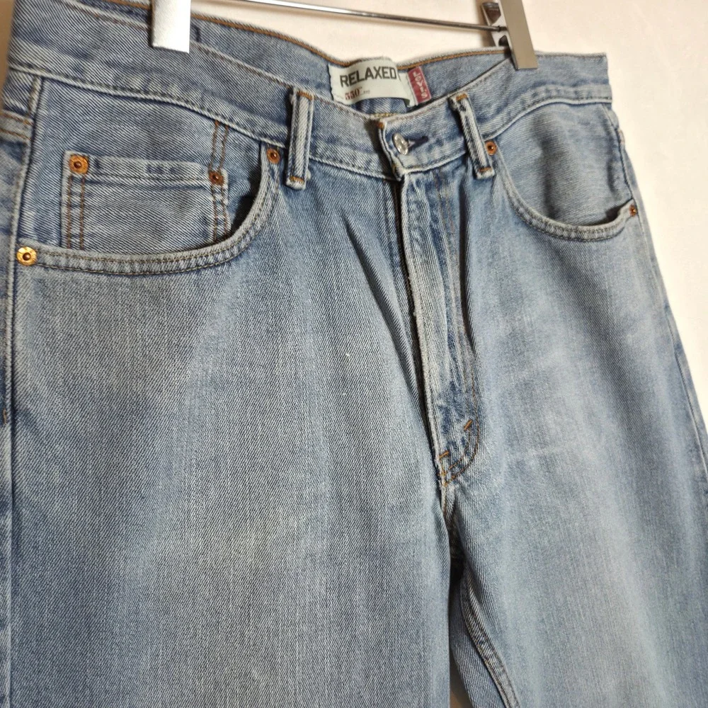 Levis 550 Relaxed Fit Tapered Leg Jeans Mens 35x30 Light Wash Blue Vintage 90s